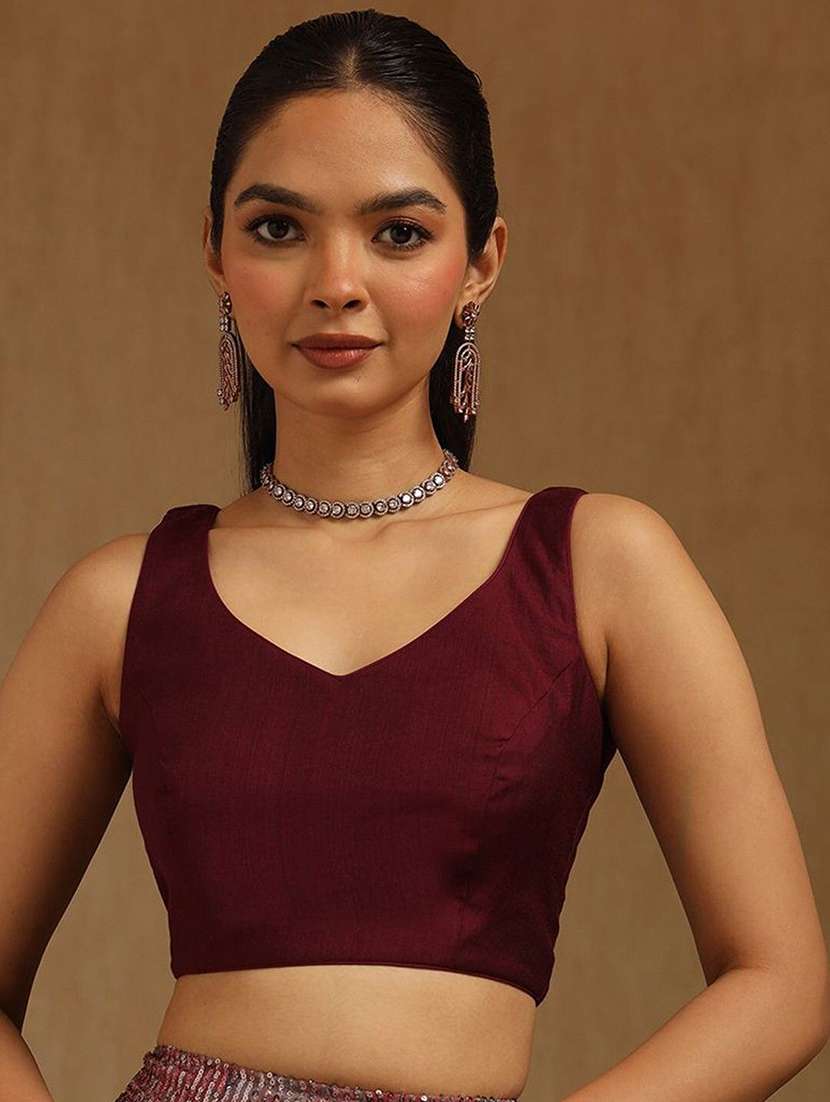 women solid sleeveless stitched blouse