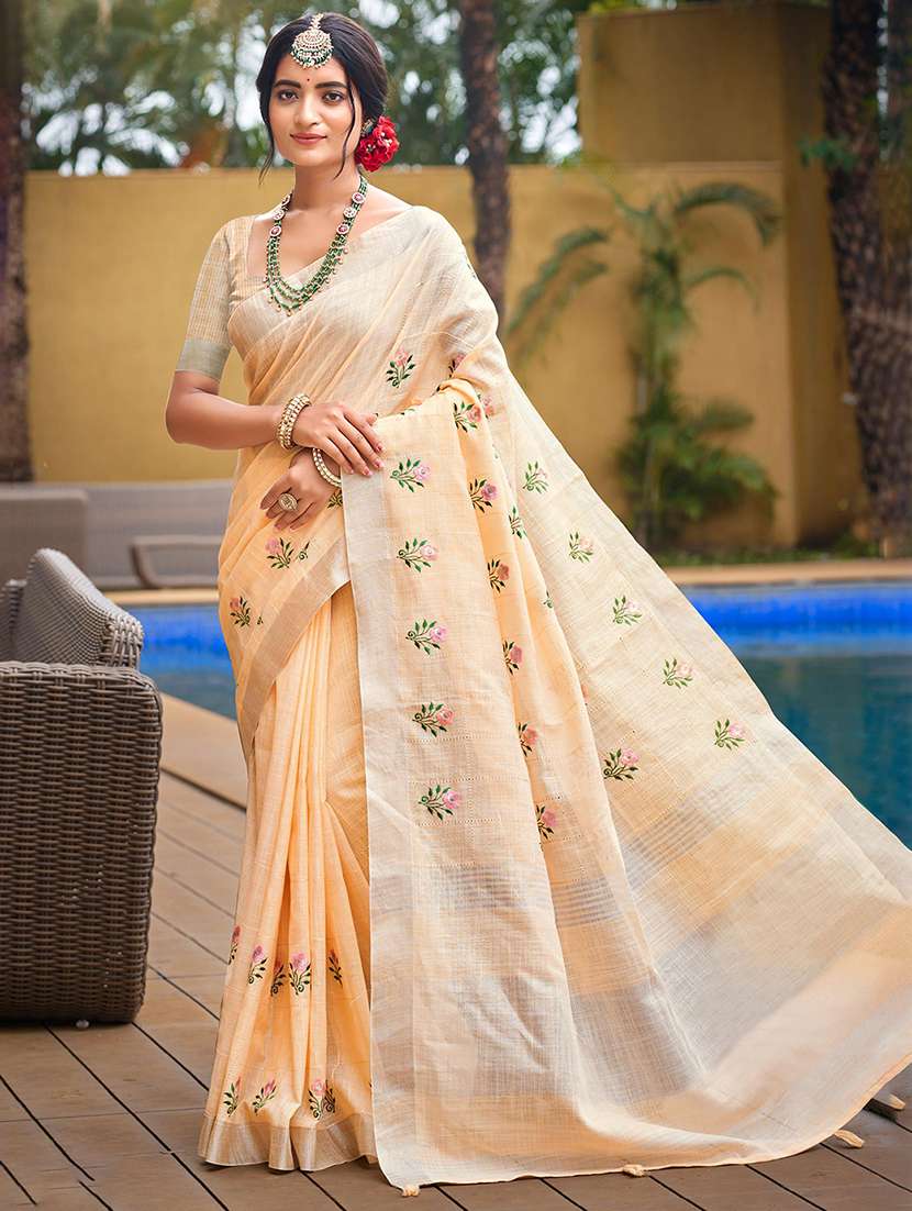 women solid with work embroidered saree with blouse