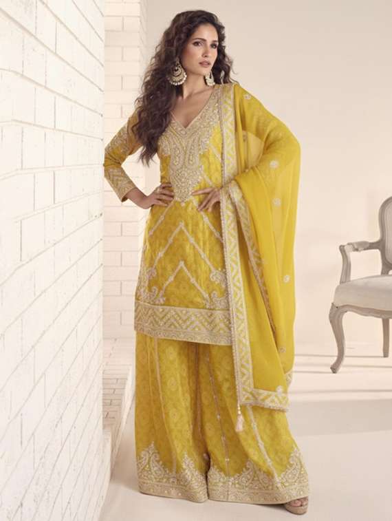 women embroidered long sleeve kurta sharara with dupatta set