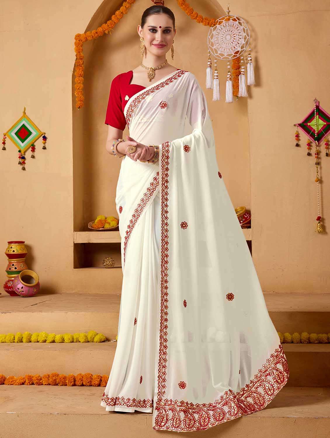 women solid with work embroidered saree with blouse