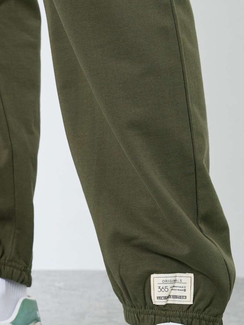 men typographic mid rise relaxed fit jogger - 22083316 -  Standard Image - 3