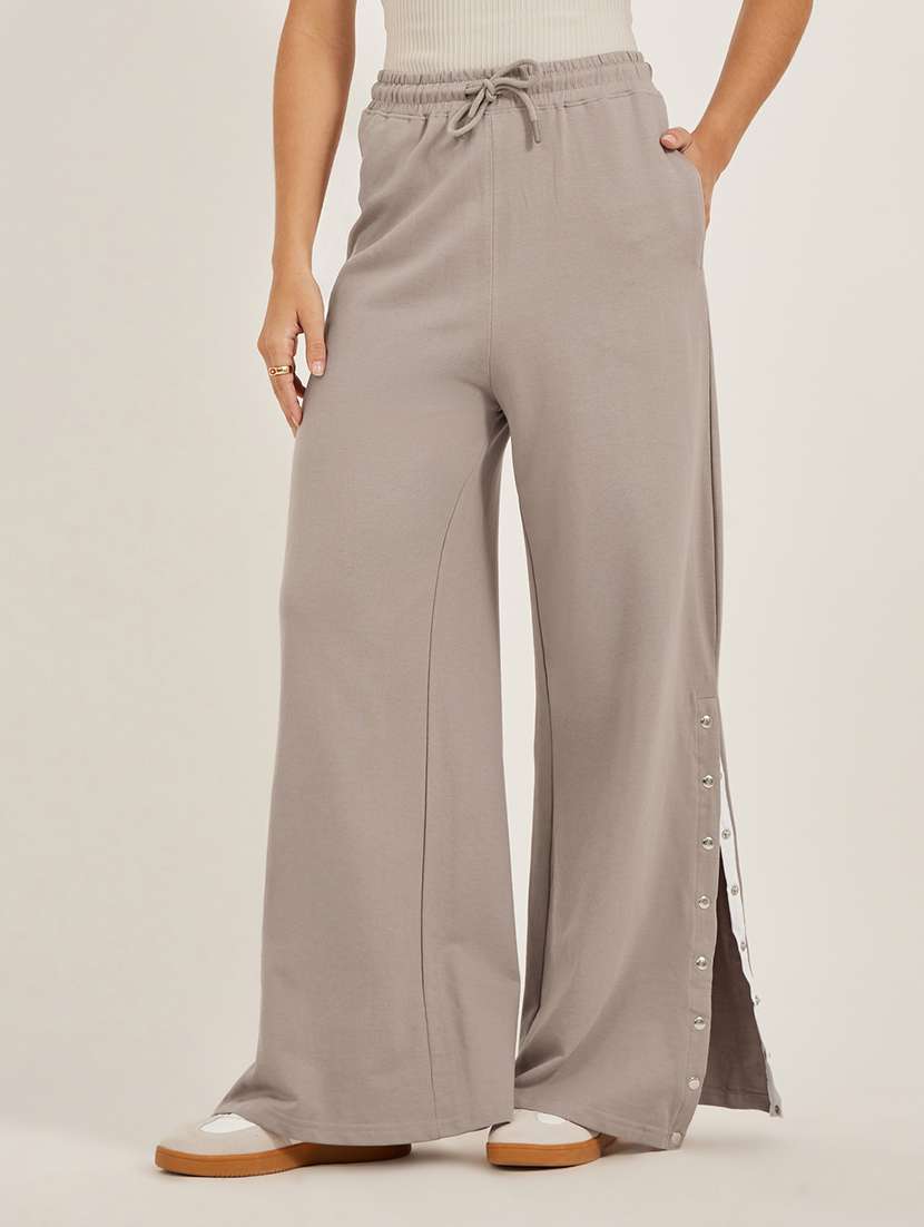 women solid mid rise relaxed fit track pant