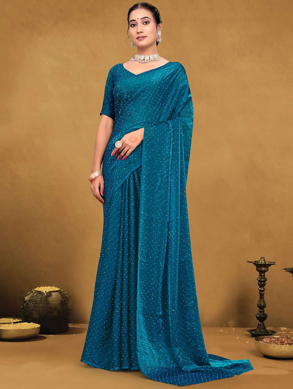 women solid with work embellished saree with blouse