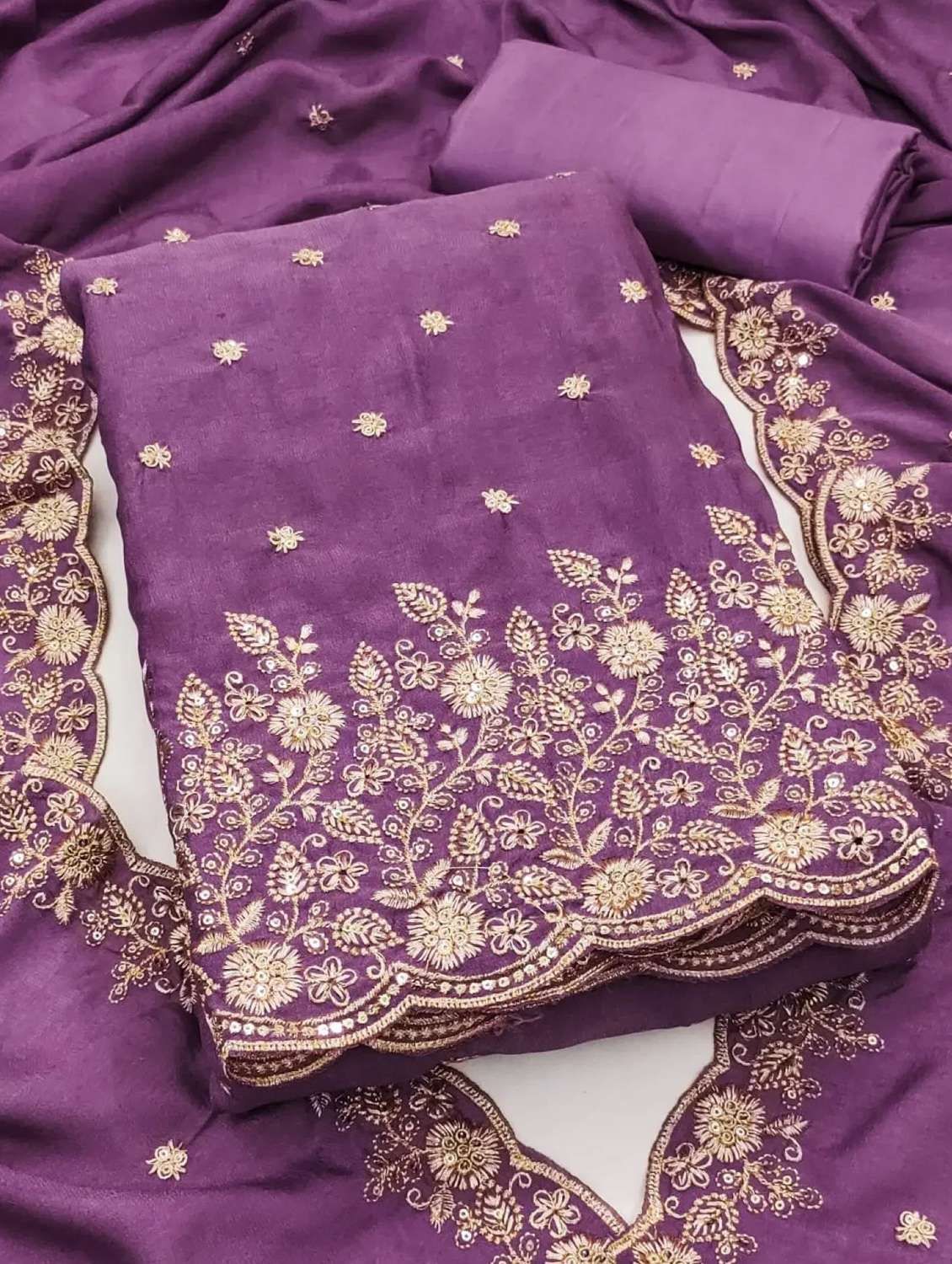 women solid wiith work embroidered unstitched suit set