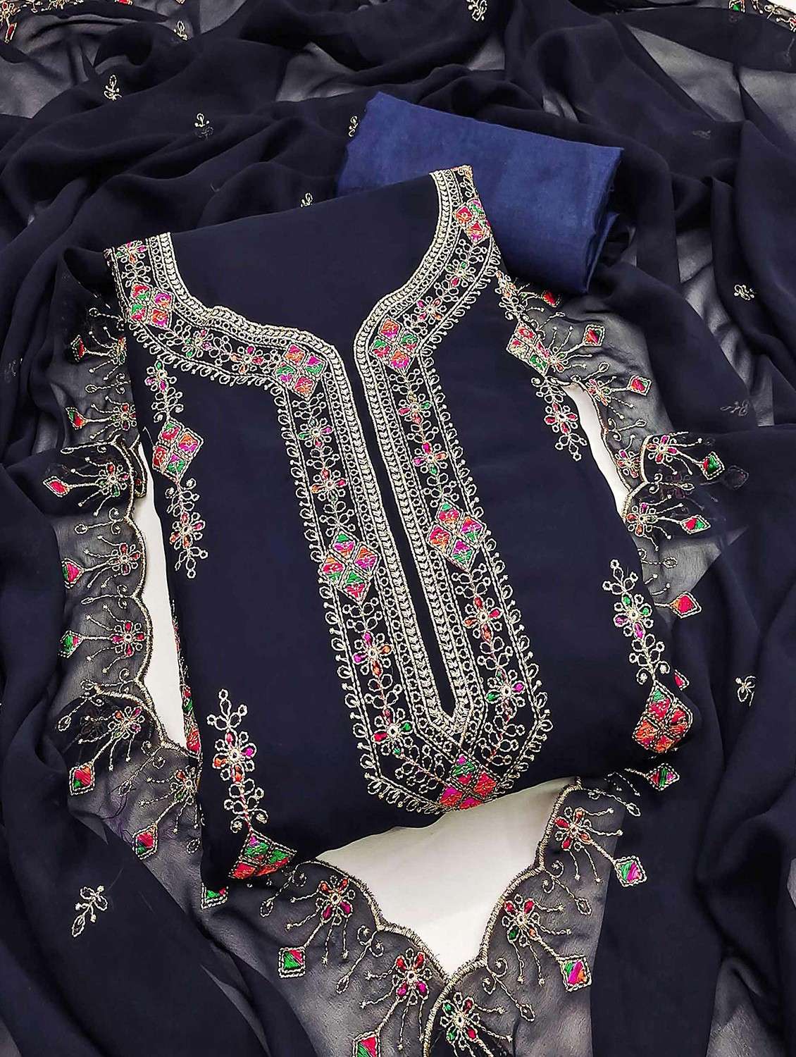 women solid with work embroidered unstitched suit set