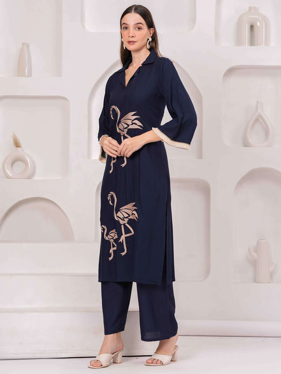 women embroidered bell sleeve kurta and palazzo set