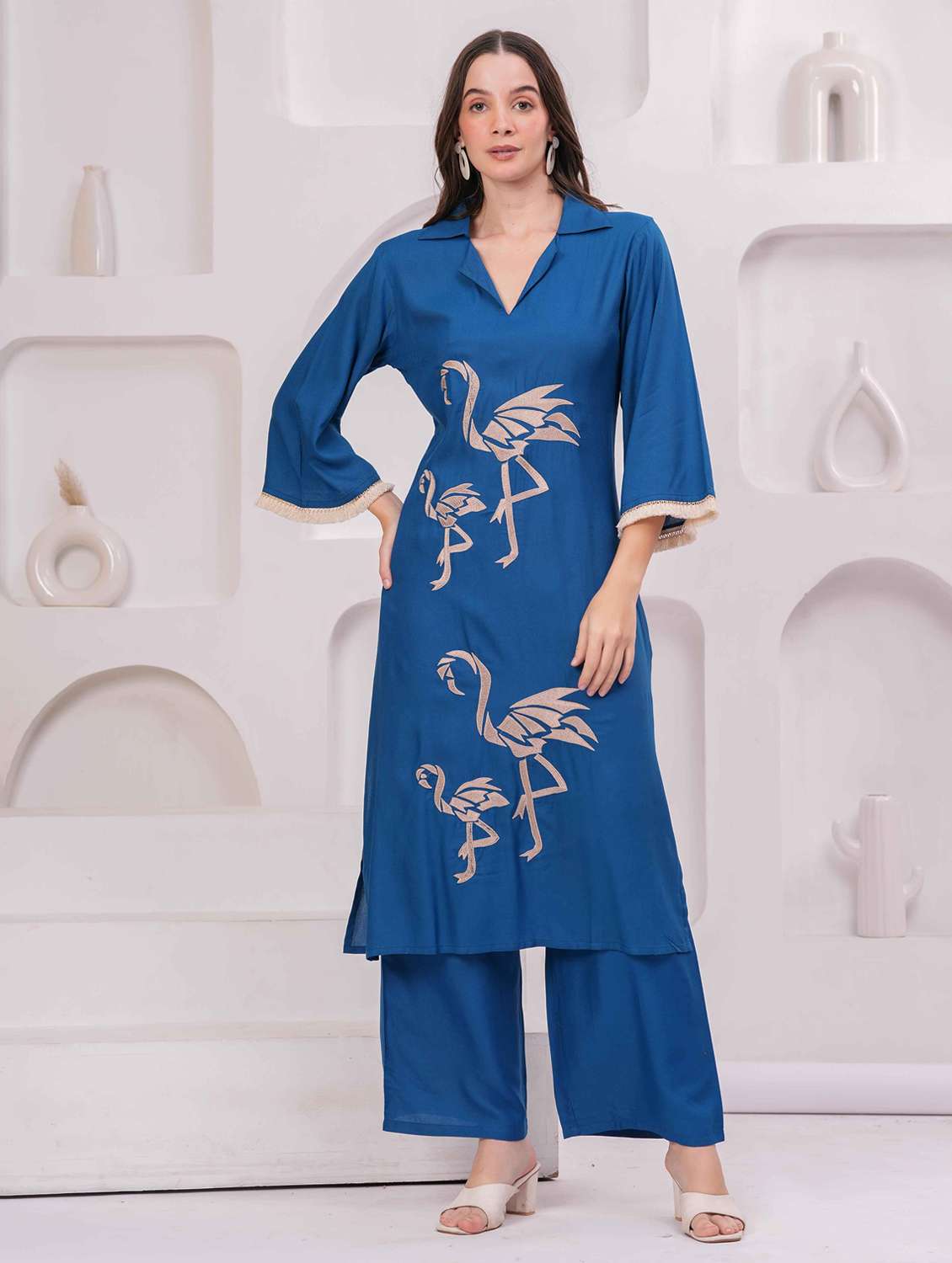 women embroidered bell sleeve kurta and palazzo set