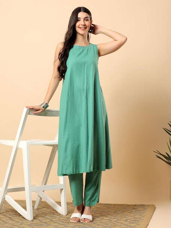 women solid round neck kurta pant set