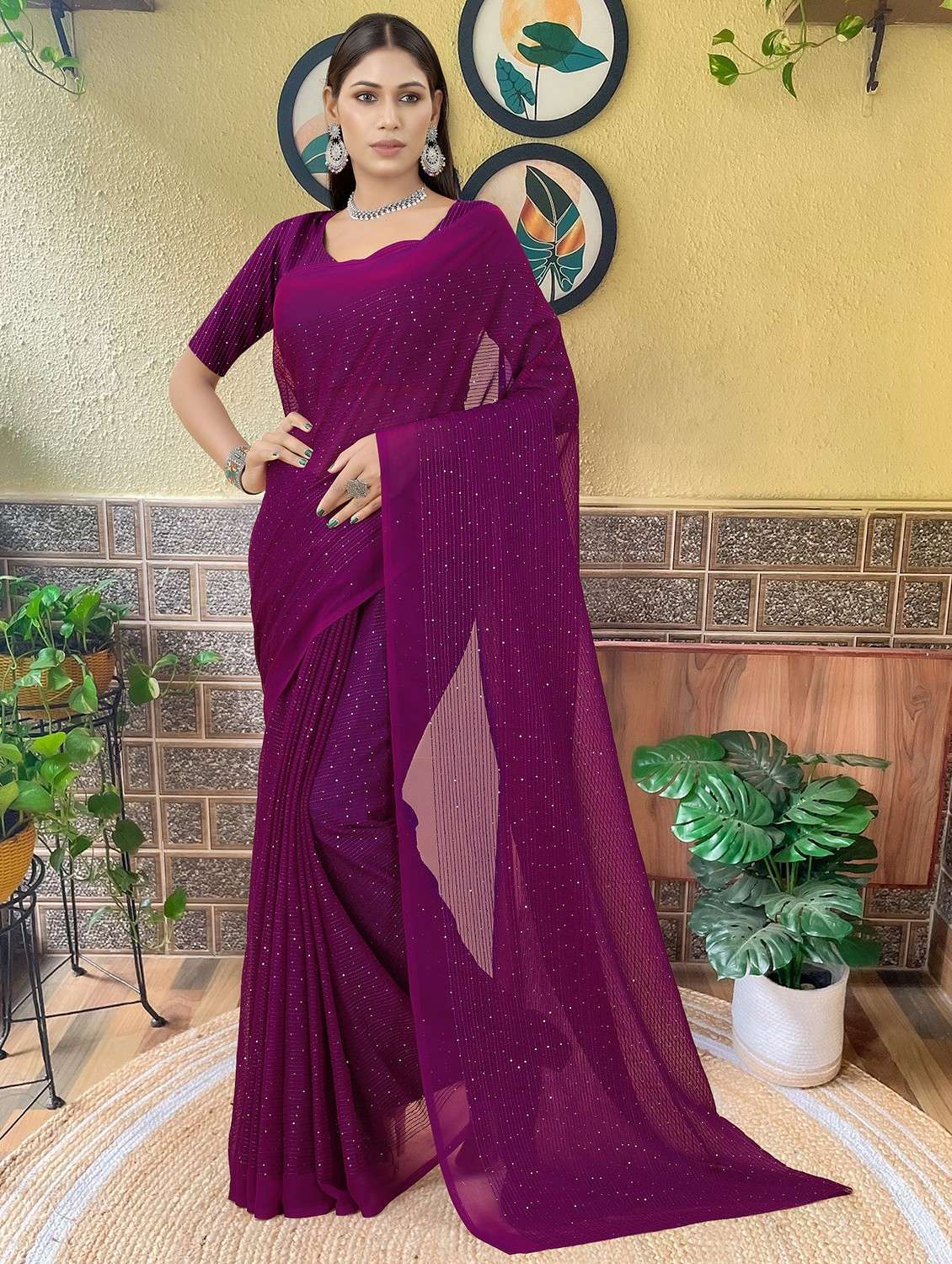 women solid with work embellished saree with blouse