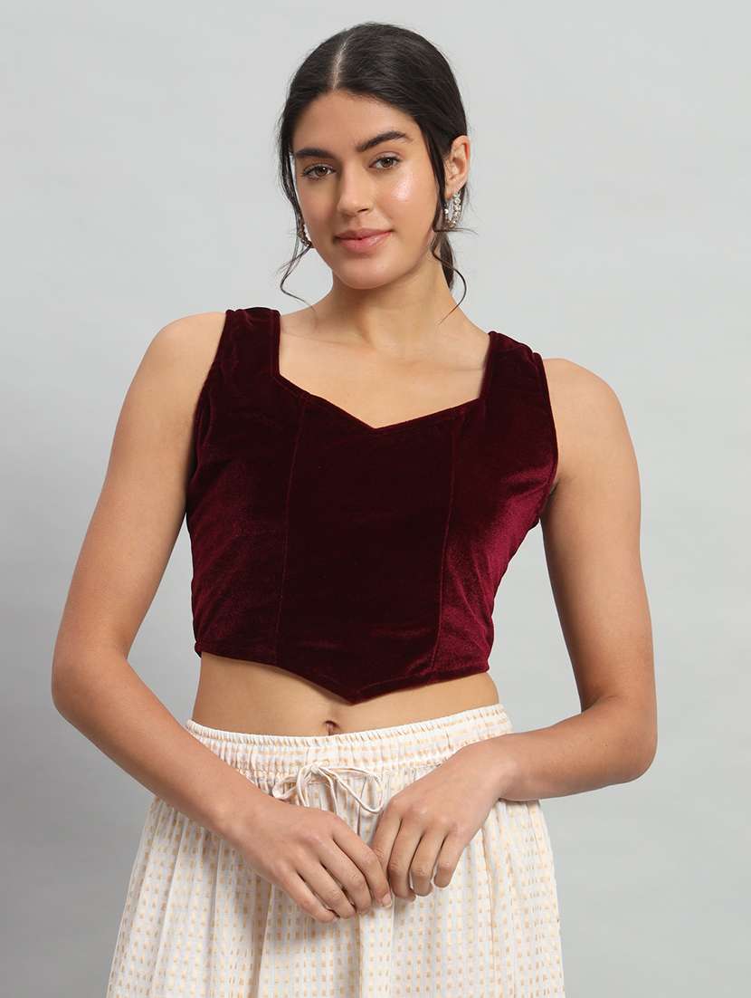 women solid sleeveless stitched blouse