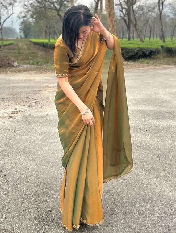 women solid with embellished bordered saree with blouse