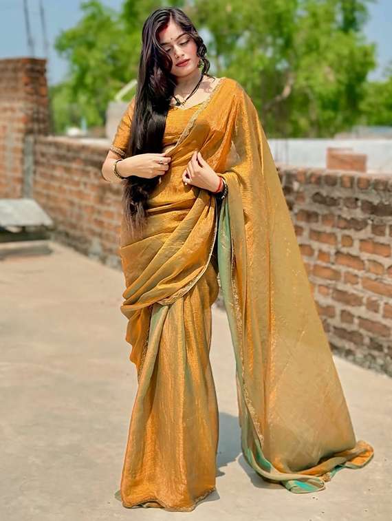 women solid with embellished bordered saree with blouse
