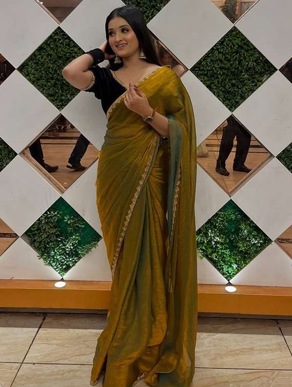 women solid with embellished bordered saree with blouse