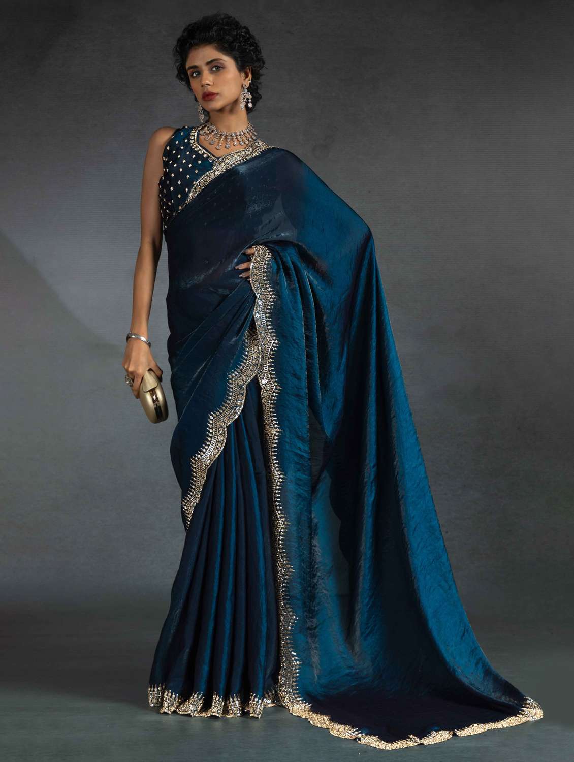 women solid with work embellished bordered saree with blouse