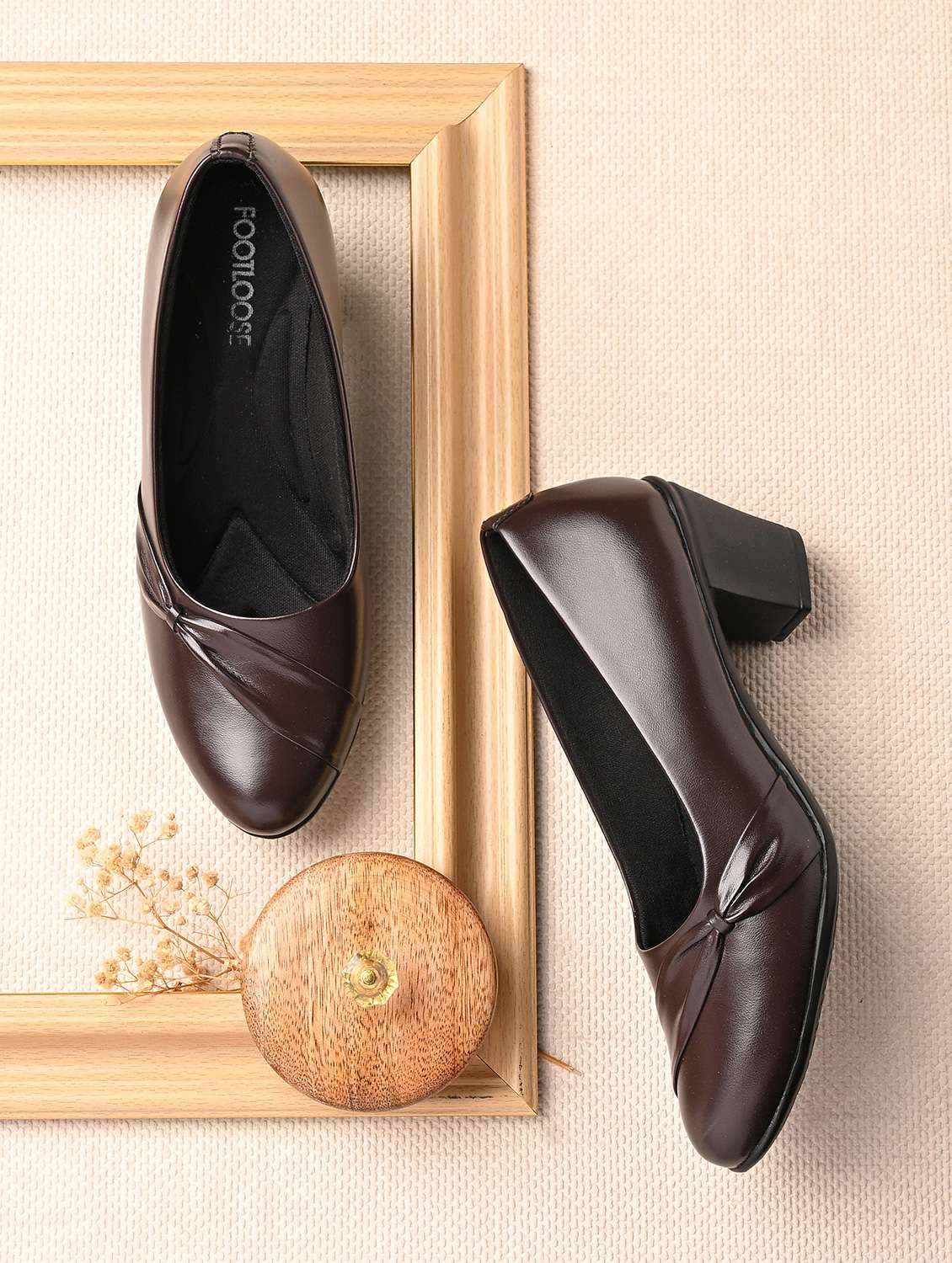 women brown slip on formal shoe