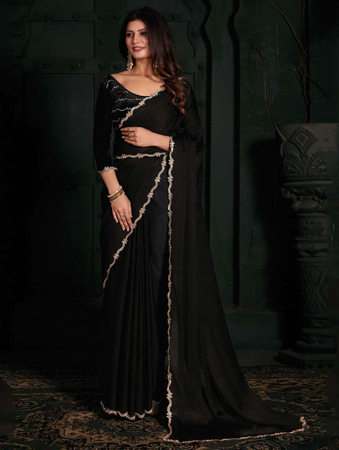 women solid with work embellished bordered saree with blouse
