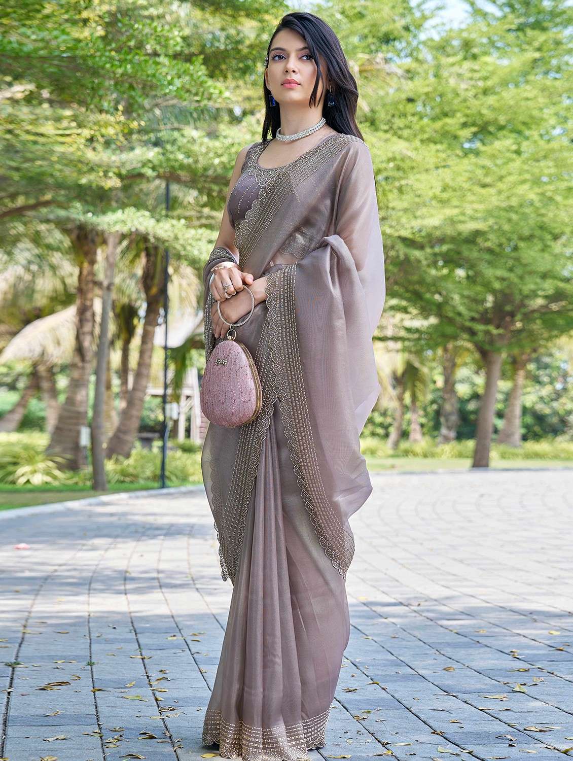 women solid with embellished bordered saree with blouse