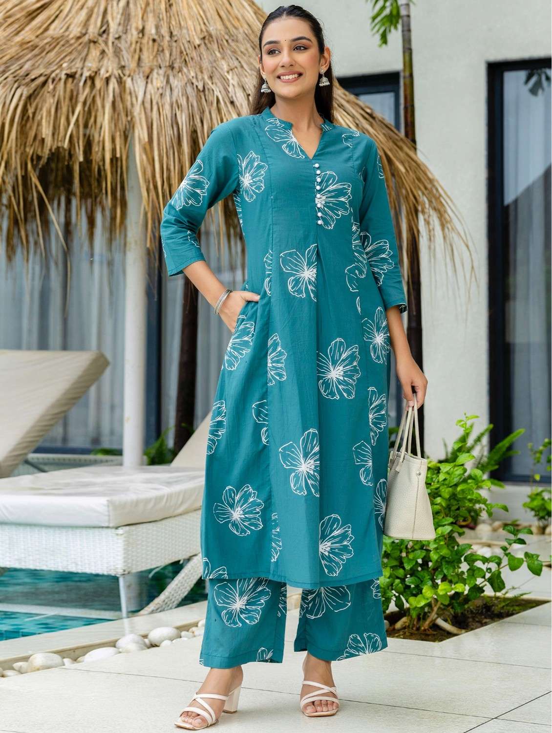 women floral printed three quarter sleeve kurta palazzo set
