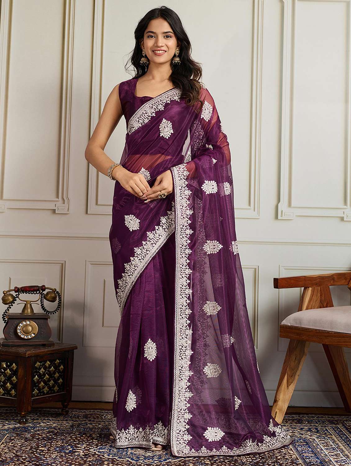 women solid with work embroidered saree with blouse