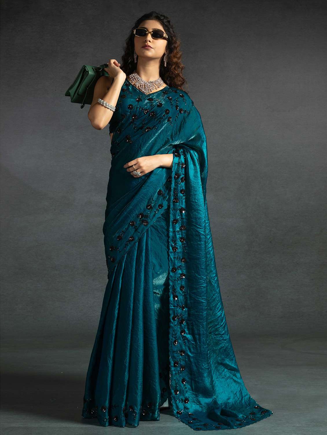women solid with work embellished saree with blouse