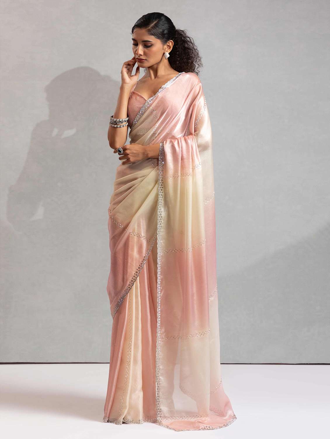 women coral embellished saree with blouse