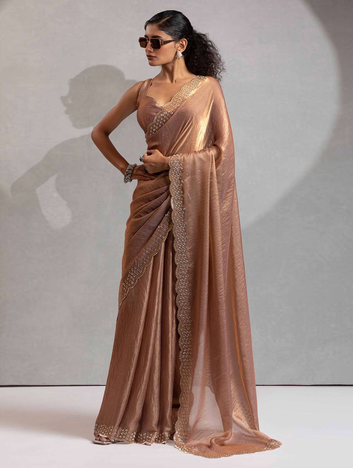 women solid with embellished bordered saree with blouse
