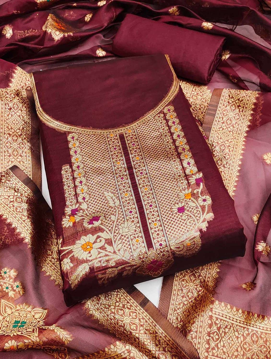 women self design unstitched suit set
