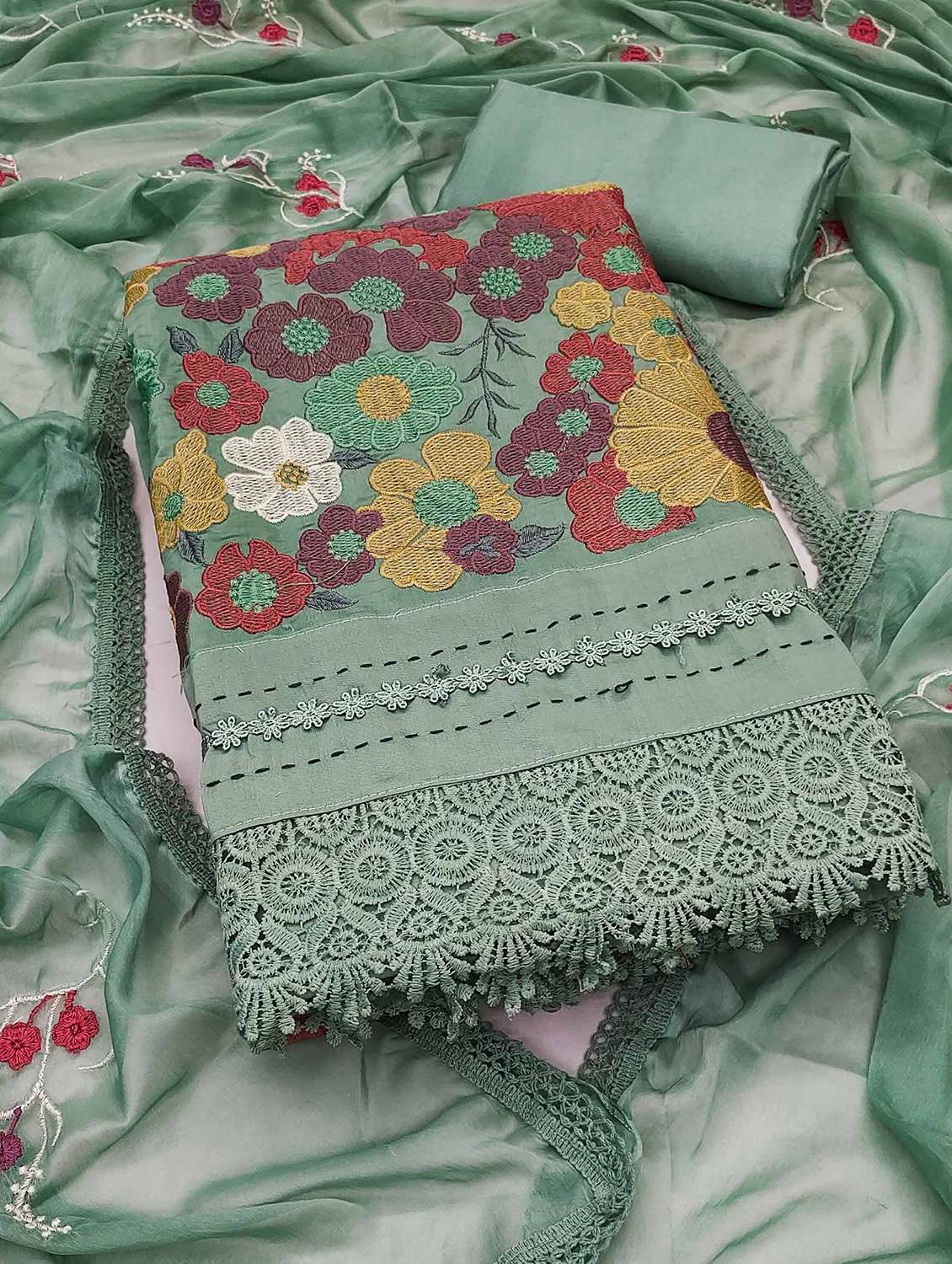 women solid wiith work embroidered unstitched suit set