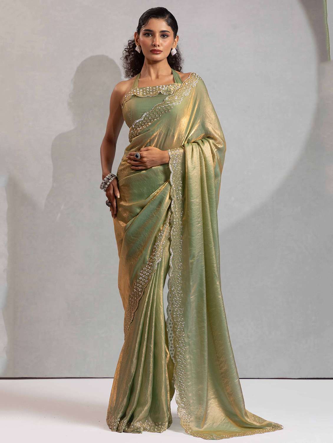 women solid with embellished bordered saree