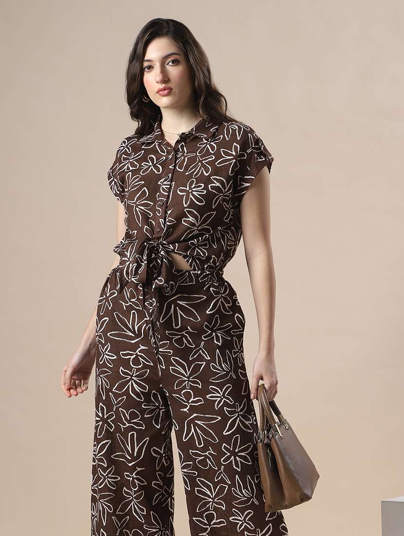 globus women brown floral print collared neck extended sleeves tie ups & cut out details flared jumpsuit