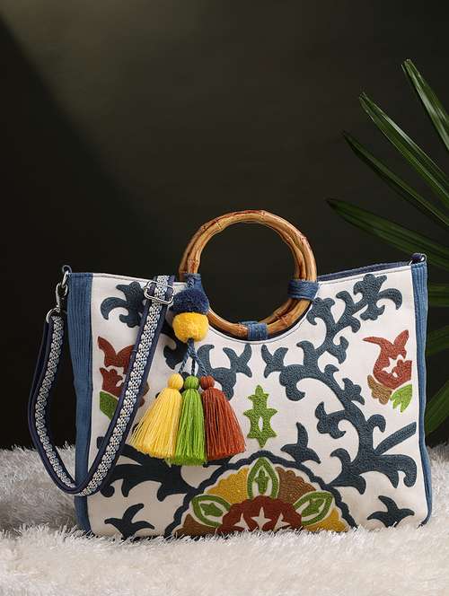 floral embroidered canvas handheld bag with tassels - 22143040 -  Standard Image - 0