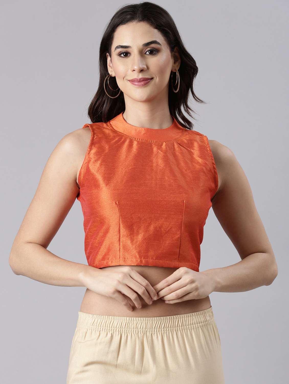 women solid sleeveless stitched blouse