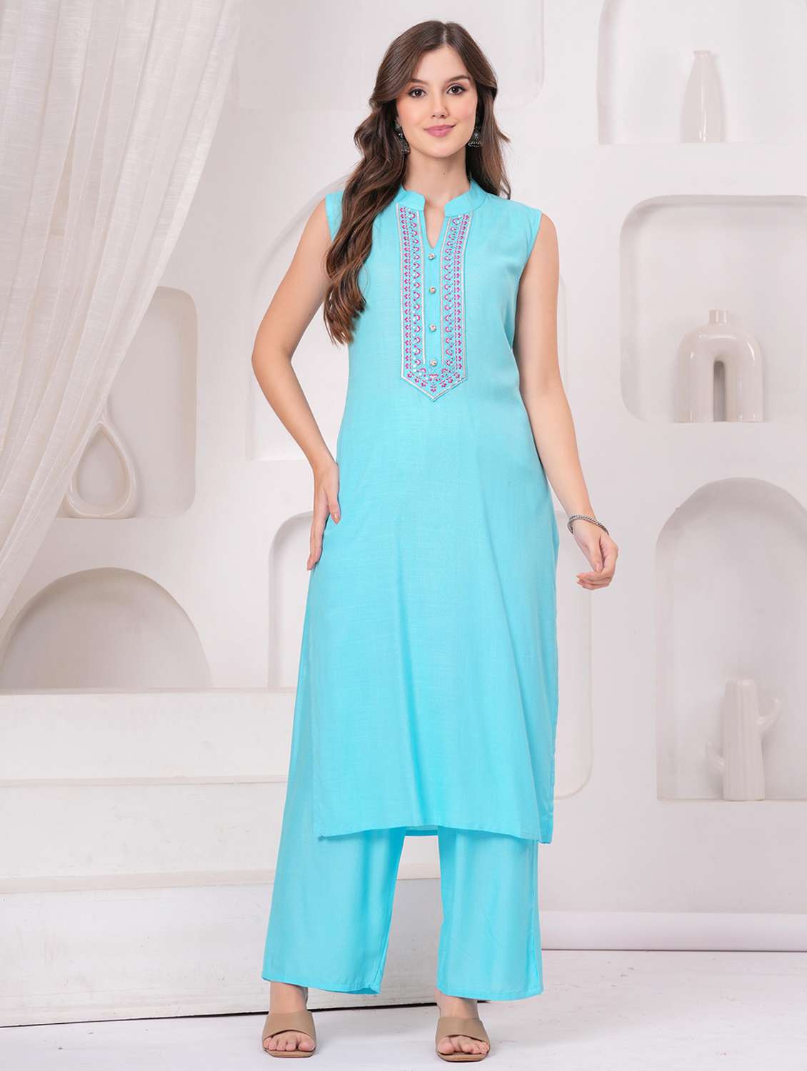 women embroidered sleeveless kurta palazzo set