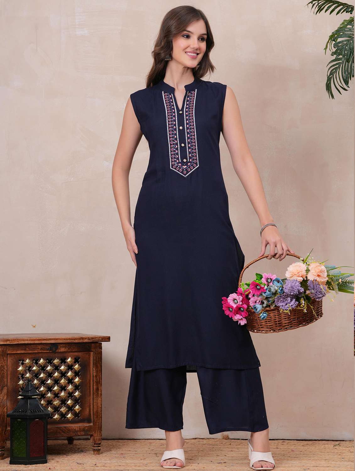 women embroidered sleeveless kurta palazzo set