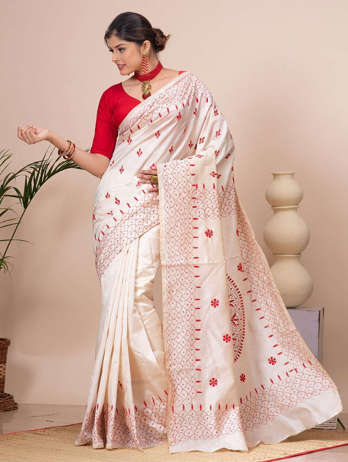 women solid with work embroidered saree with blouse
