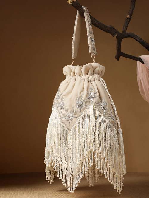 embroidered velvet potli with fringe - 22147171 -  Standard Image - 0