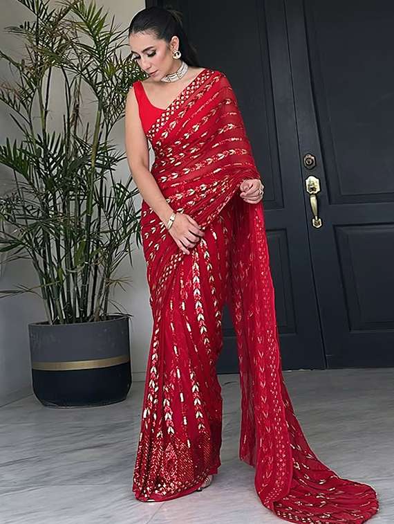 women solid with work embellished saree with blouse