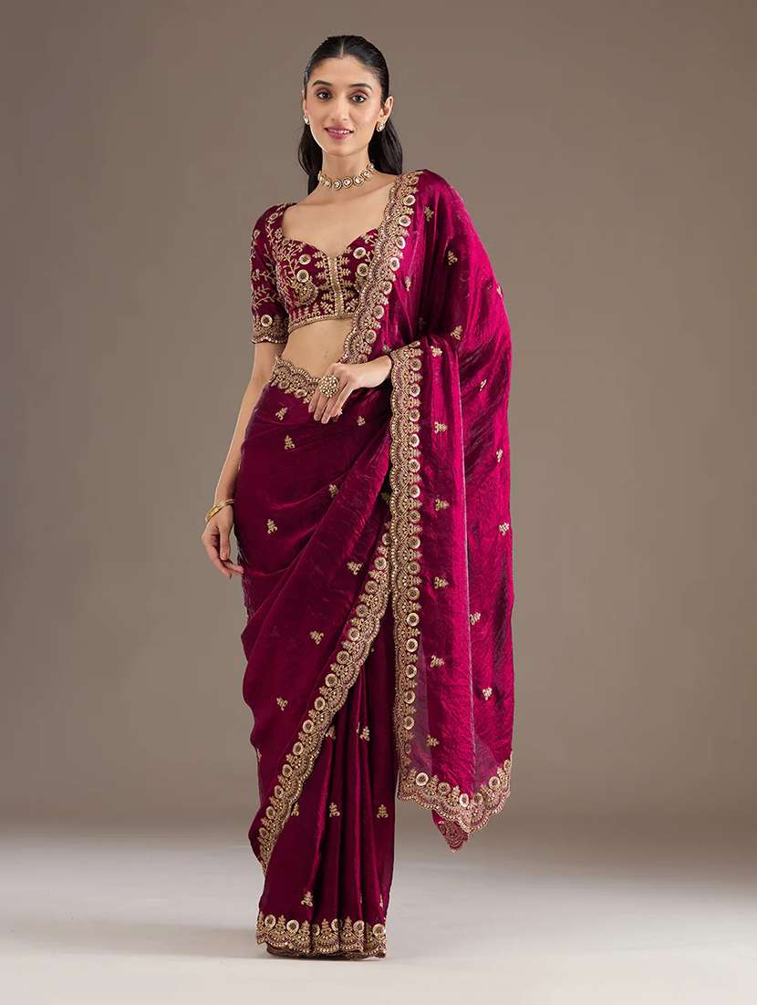 women solid with work embroidered saree with blouse