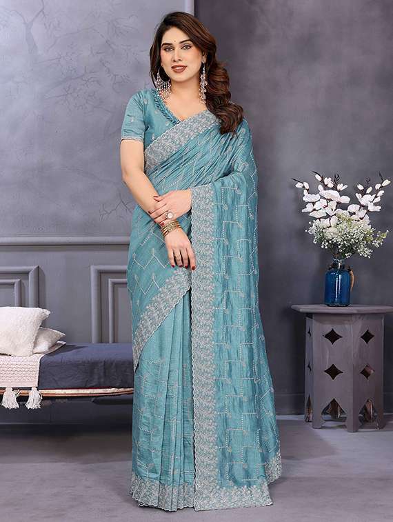 women solid with work embroidered saree with blouse