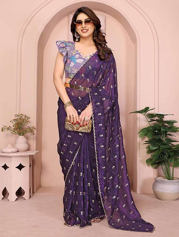women solid with work embroidered saree with blouse