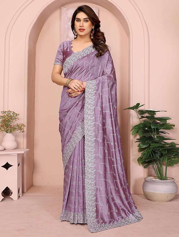 women solid with work embroidered saree with blouse