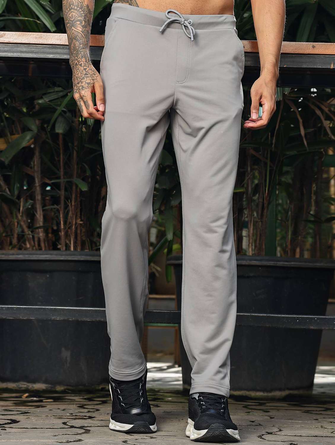 men solid mid rise full length track pant