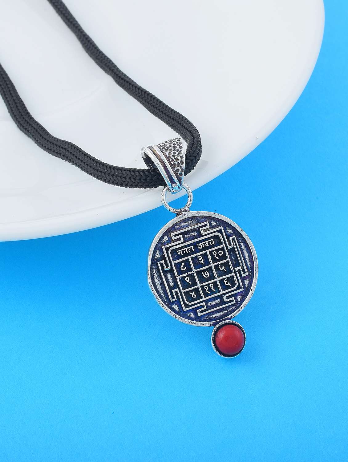 silver-plated brass pendant with gemstone