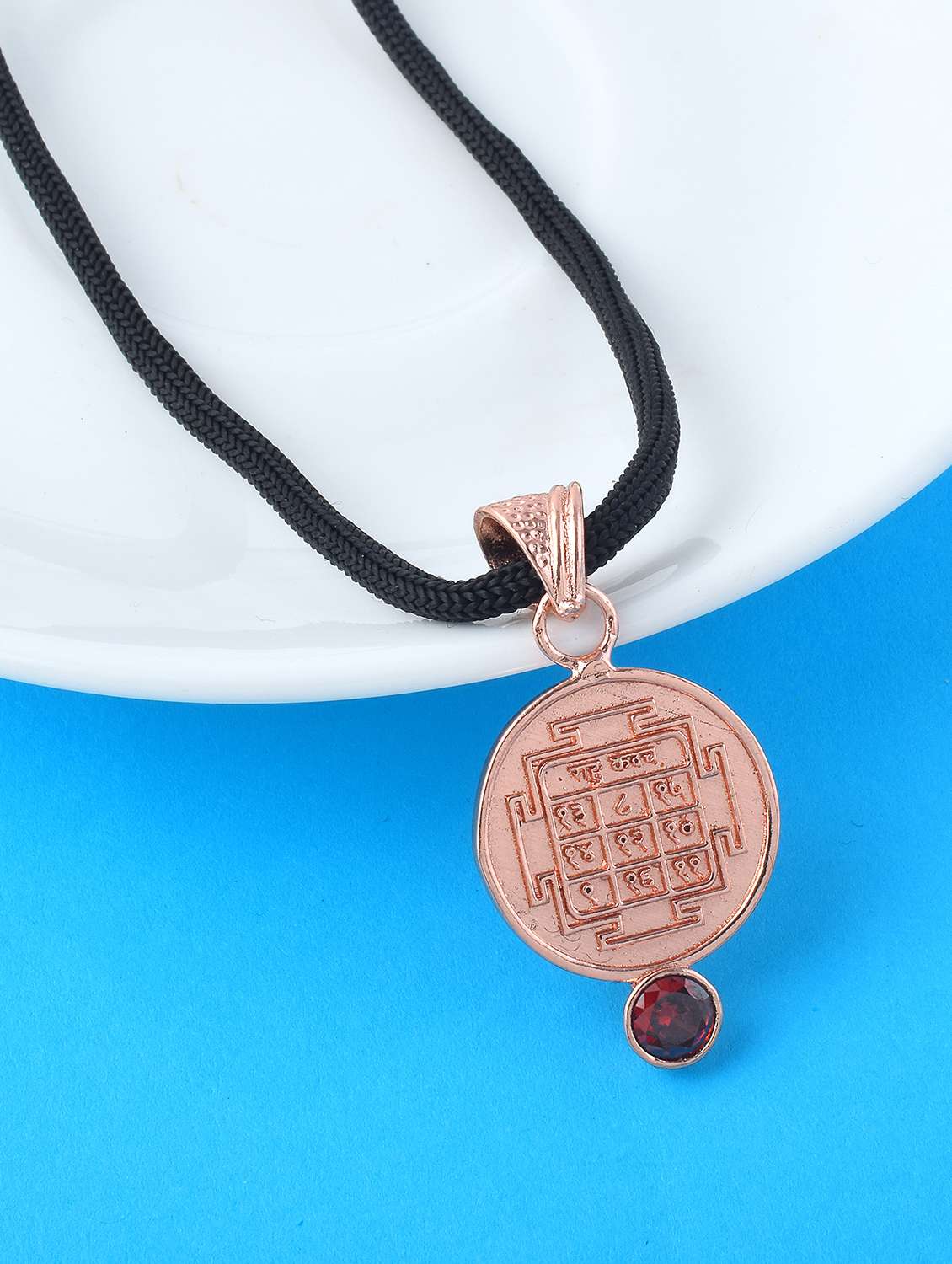 gold-plated brass pendant with gemstone