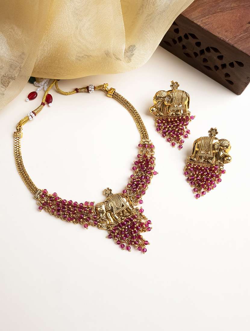 gold plated gaj necklace set with red hydra beads