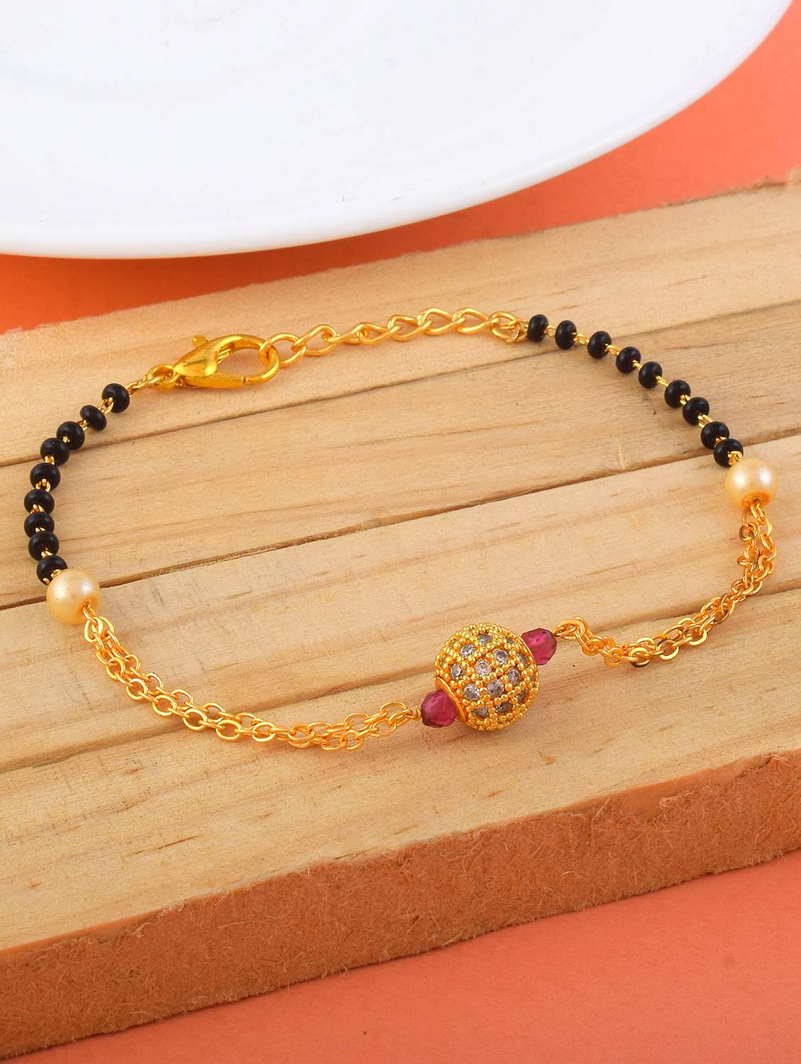 gold mangalsutra bracelet with beads