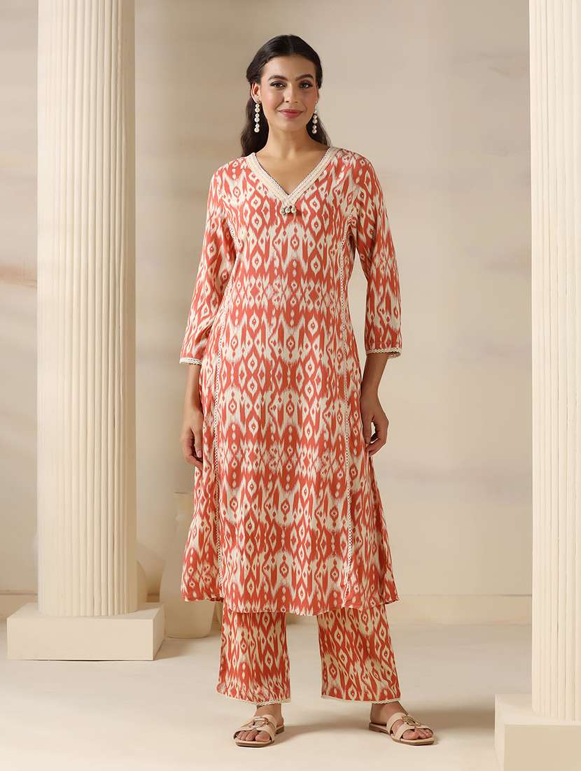 women ikat printed three quarter sleeve kurta pant set
