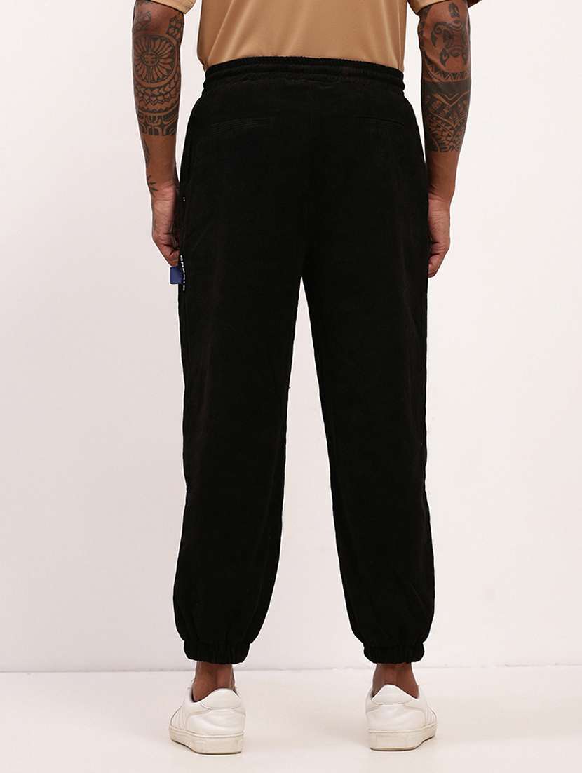   men solid mid rise relaxed fit jogger - 22173639 -  Standard Image - 3