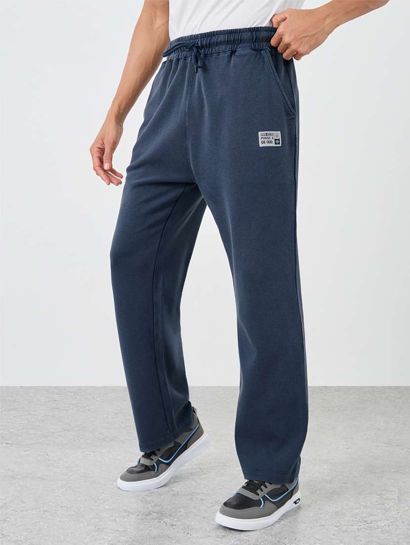 men solid mid rise full length track pant