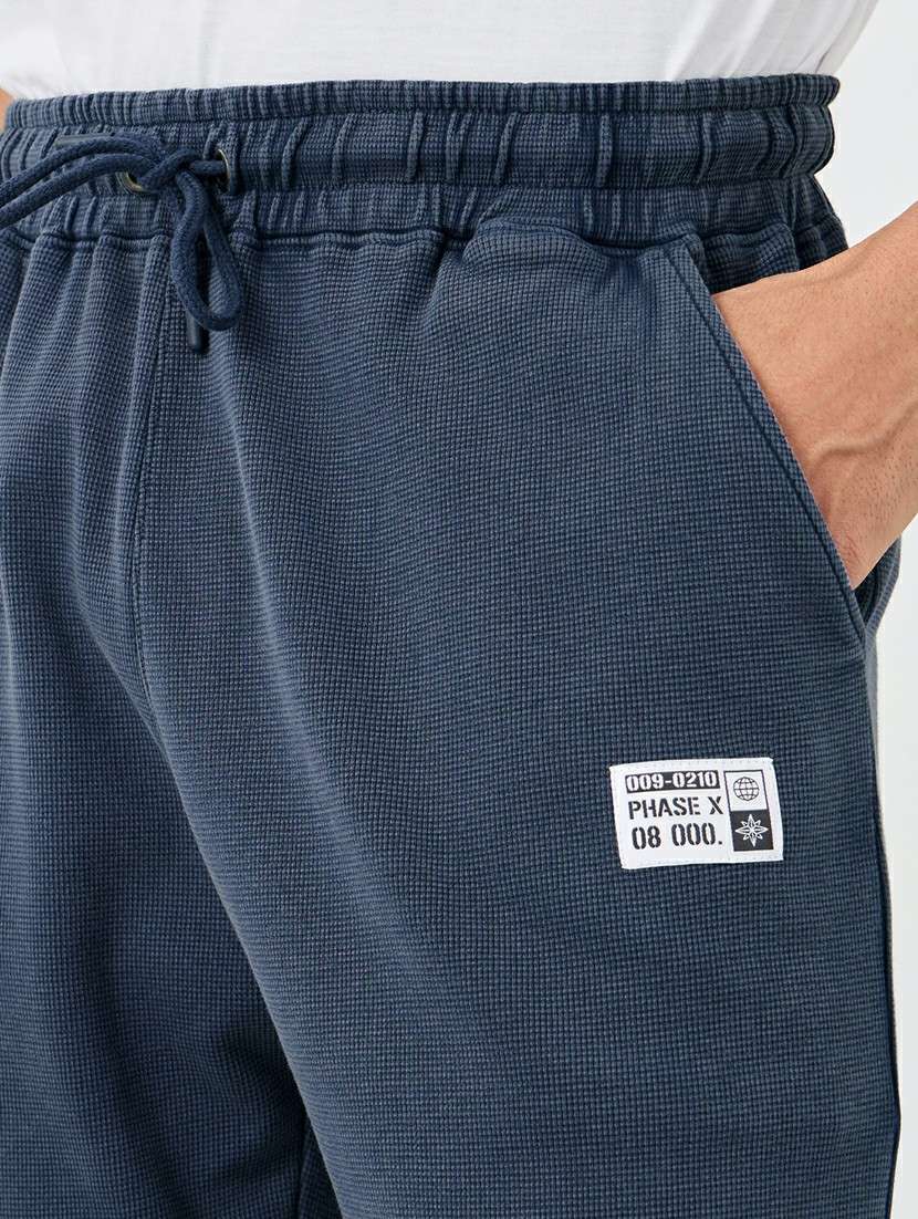 men solid mid rise full length track pant - 22174777 -  Standard Image - 3